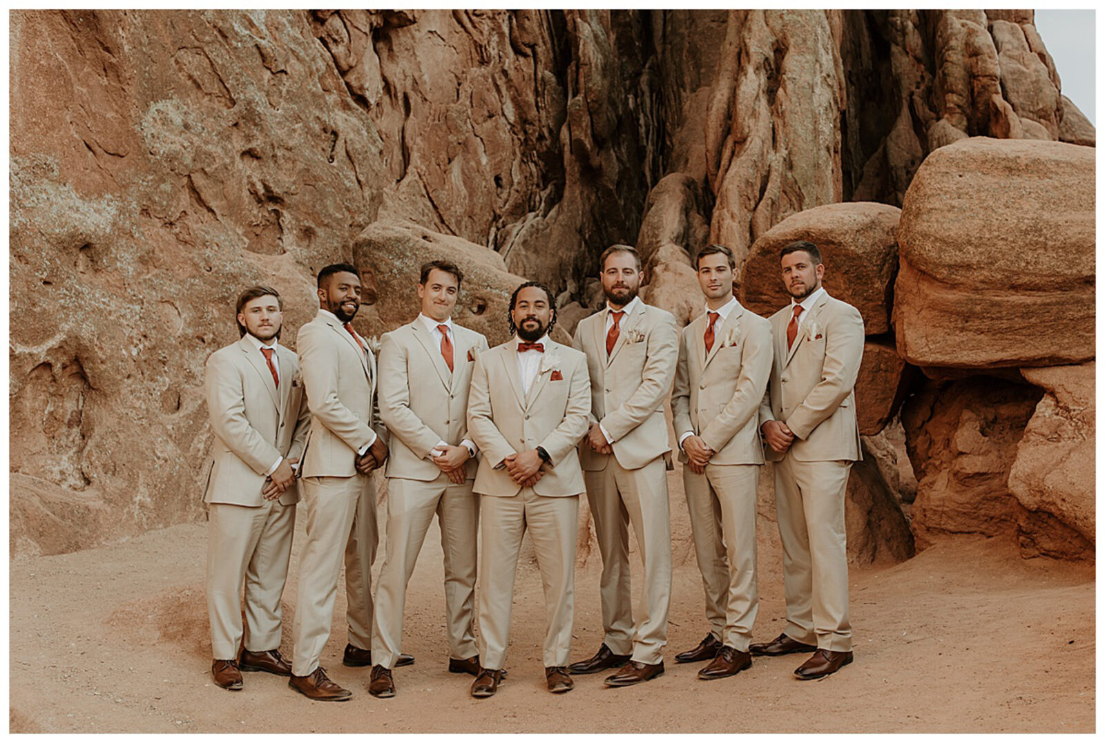 Garden of the Gods, Colorado boho micro wedding. Groom and groomsmen. Boho groomsmen suits. Neutral colored wedding suits.