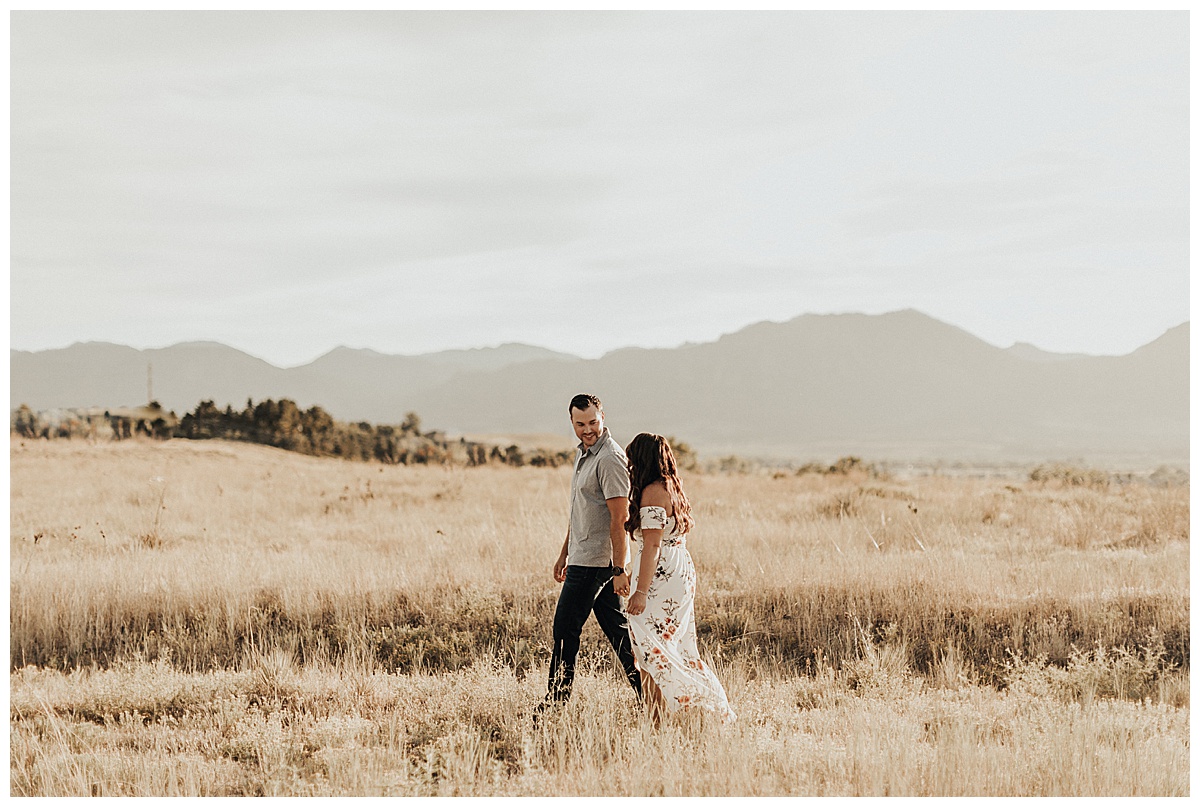 Romantic and flirty engagement session at Davidson Mesa Trail in Boudler, Colorado