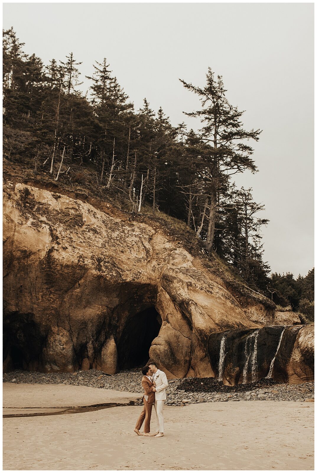Boho same sex marriage in the beautiful state of Oregon at Hug Point on the west coast. Gay couple wedding day suit inspiration.