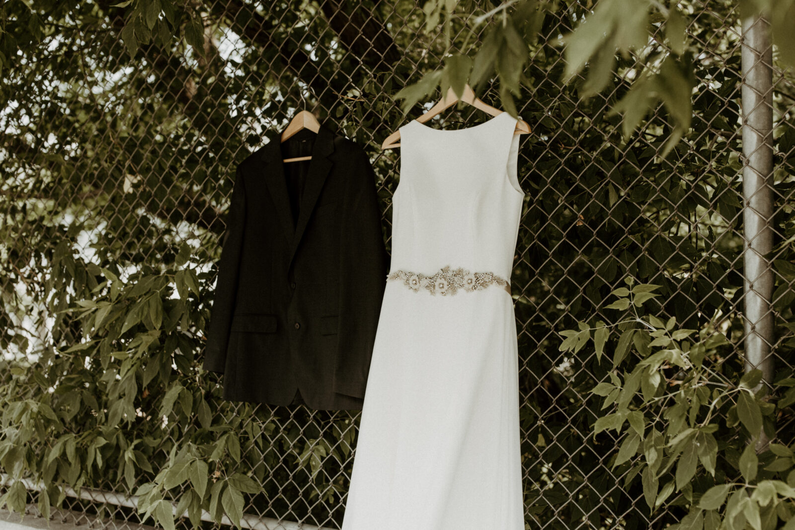Simple and modern bride wedding dress. Modern groom wedding suit.