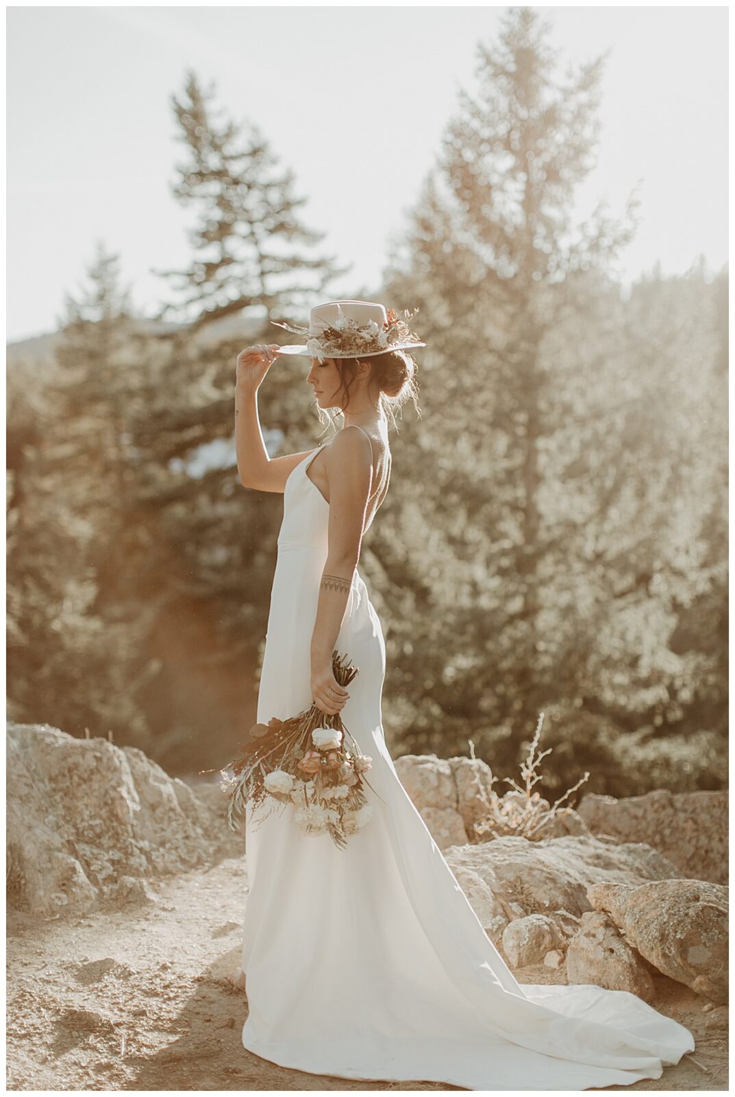 Boho bride dress and hat inspo in beautiful Colorado